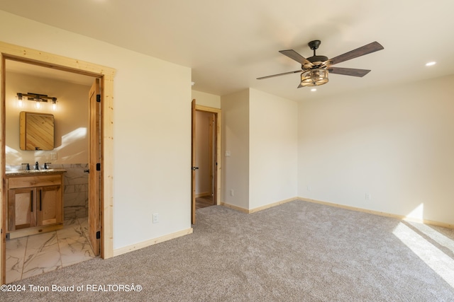 1424 Fairview Dr, Dubois, WY 82513 - unfurnished bedroom with recessed lighting, light carpet, and ensuite bathroom