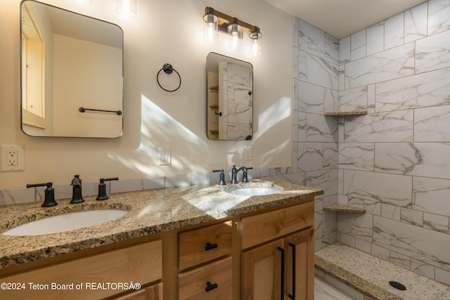 1424 Fairview Dr, Dubois, WY 82513 - bathroom featuring double vanity and tiled shower