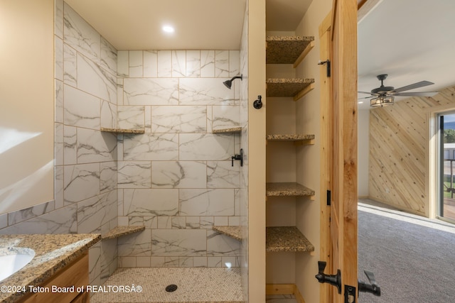 1424 Fairview Dr, Dubois, WY 82513 - full bathroom featuring tiled shower, ceiling fan, and vanity
