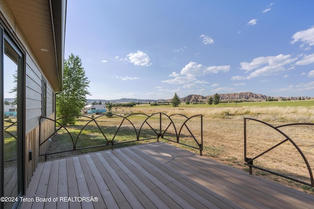 1424 Fairview Dr, Dubois, WY 82513 - wooden deck featuring a mountain view and a view of countryside