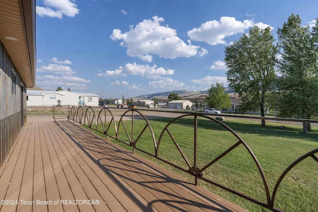 1424 Fairview Dr, Dubois, WY 82513 - wooden terrace with a residential view and a yard