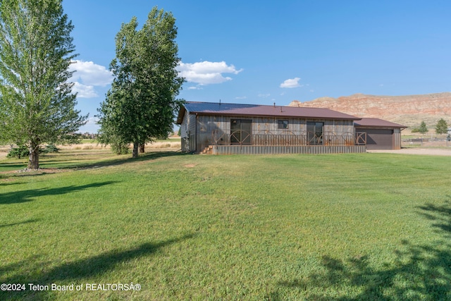 exterior space with a front yard