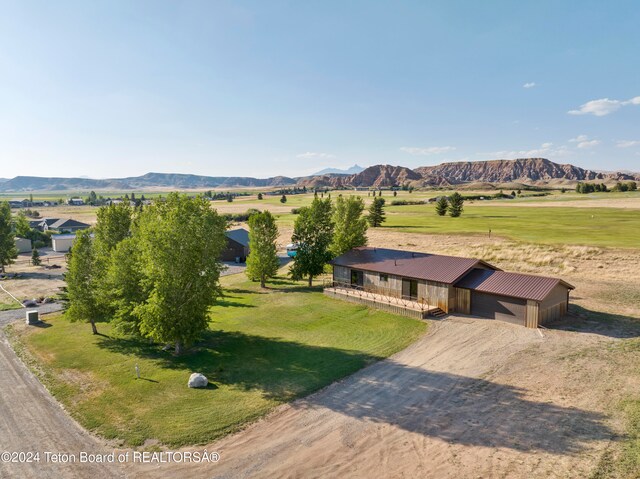 aerial view featuring a mountain view and a rural view