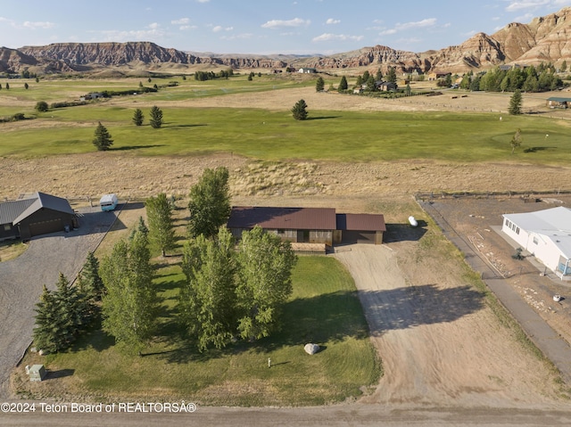 1424 Fairview Dr, Dubois, WY 82513 - aerial view of property's location with a mountain backdrop and a golf club