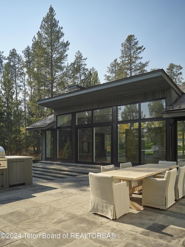 7750 N Lower Granite Ridge Rd, Teton Village, WY 83025 - view of patio featuring outdoor dining area