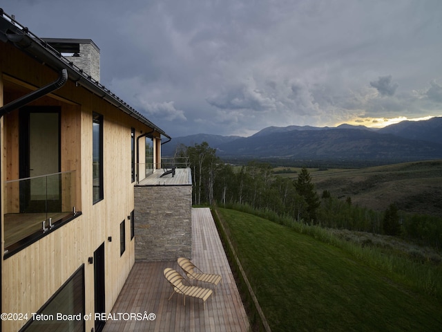2680 Trader Rd, Jackson, WY 83001 - view of side of property with a mountain view and a chimney