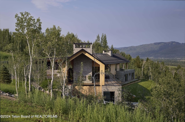 exterior space featuring a mountain view