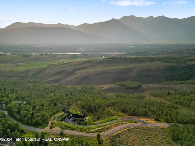 2680 Trader Rd, Jackson, WY 83001 - mountain view featuring a wooded view