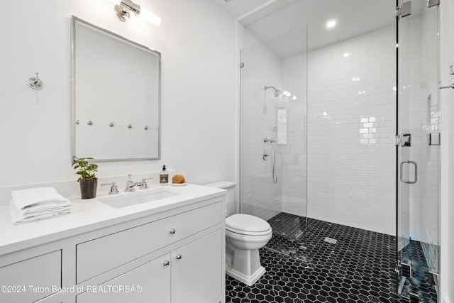 2680 Trader Rd, Jackson, WY 83001 - full bath featuring toilet, vanity, recessed lighting, a stall shower, and tile patterned floors