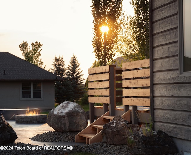 exterior space featuring a fire pit