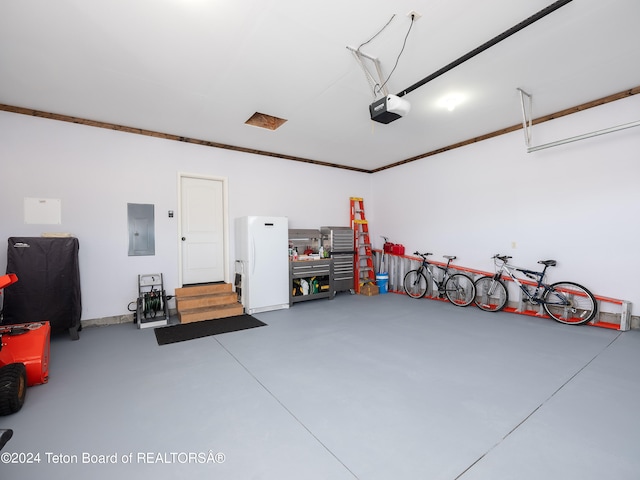 garage with a garage door opener, electric panel, and white fridge