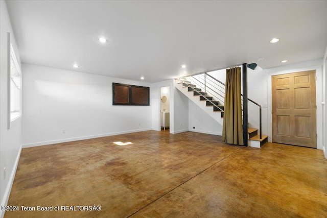 interior space featuring concrete floors