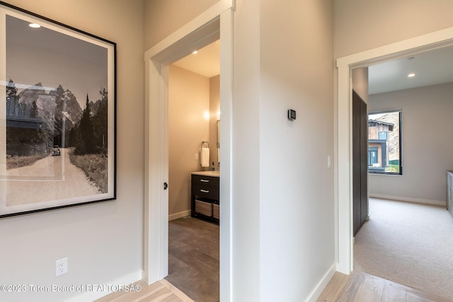 hallway featuring light hardwood / wood-style floors