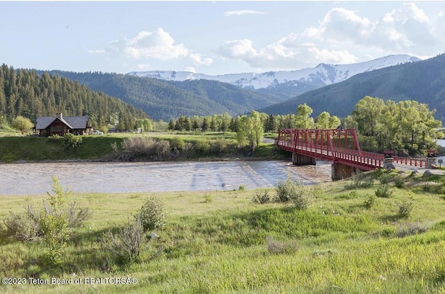 property view of mountains featuring a water view