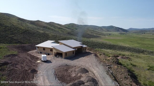 property view of mountains featuring a rural view