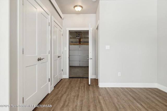 hall featuring light hardwood / wood-style flooring