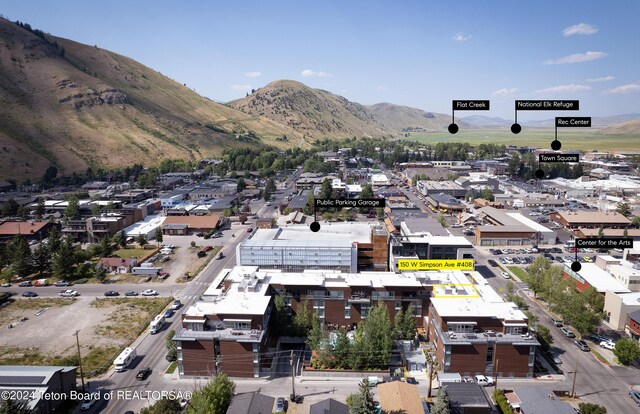 bird's eye view with a mountain view