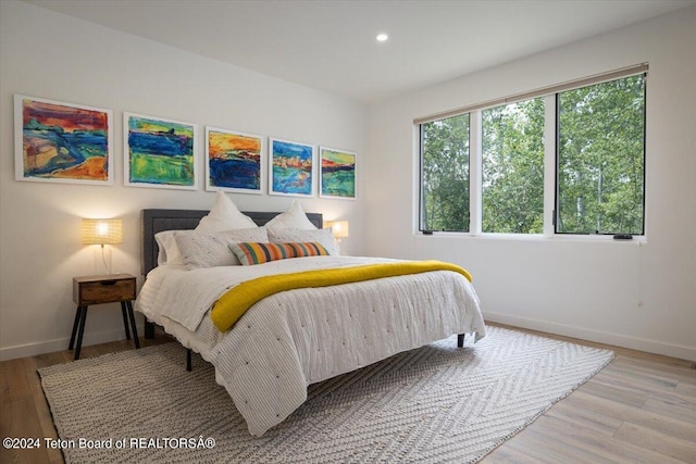 bedroom featuring light hardwood / wood-style flooring