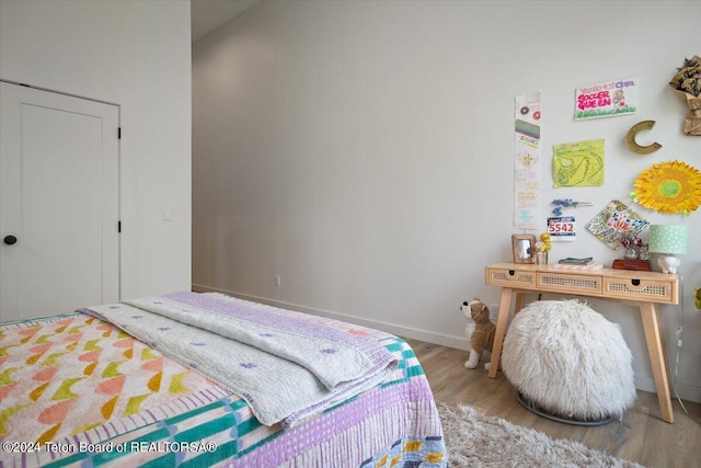 bedroom featuring hardwood / wood-style floors