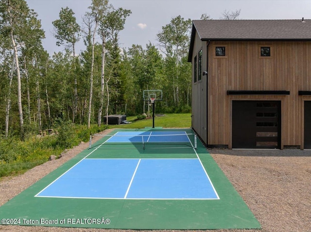 view of basketball court featuring tennis court