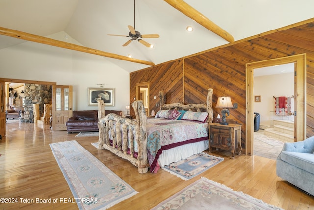 14 Table Top Dr, Dubois, WY 82513 - bedroom featuring wooden walls, high vaulted ceiling, and wood finished floors