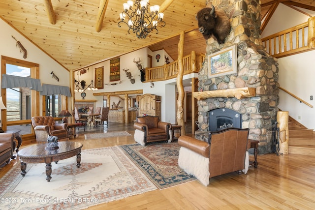 14 Table Top Dr, Dubois, WY 82513 - living area featuring high vaulted ceiling, stairs, a chandelier, wood finished floors, and wooden ceiling