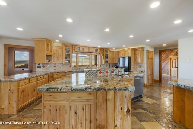 14 Table Top Dr, Dubois, WY 82513 - kitchen with dishwasher, freestanding refrigerator, a center island, backsplash, and recessed lighting