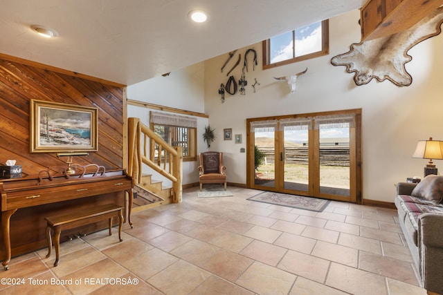 14 Table Top Dr, Dubois, WY 82513 - entryway featuring plenty of natural light, baseboards, stairs, a high ceiling, and recessed lighting