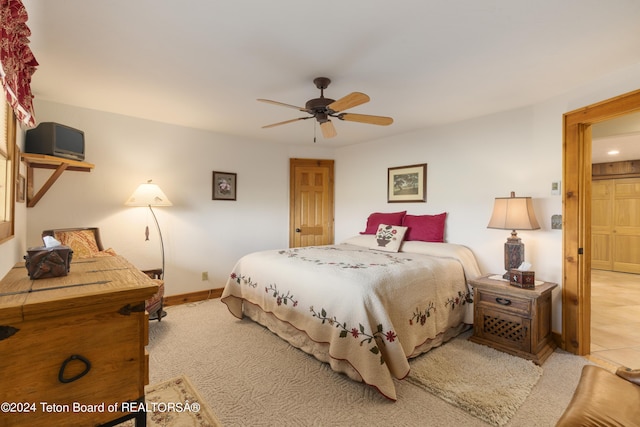 14 Table Top Dr, Dubois, WY 82513 - bedroom featuring baseboards, ceiling fan, and carpet