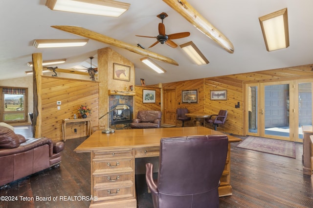 14 Table Top Dr, Dubois, WY 82513 - office space with wooden walls, dark wood finished floors, ceiling fan, and a stone fireplace
