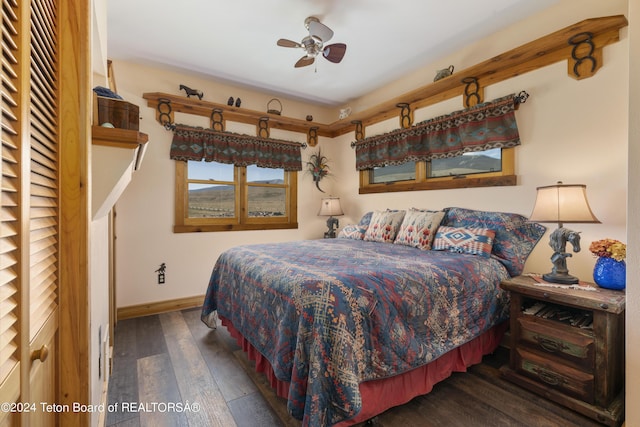 14 Table Top Dr, Dubois, WY 82513 - bedroom with hardwood / wood-style flooring, baseboards, and ceiling fan