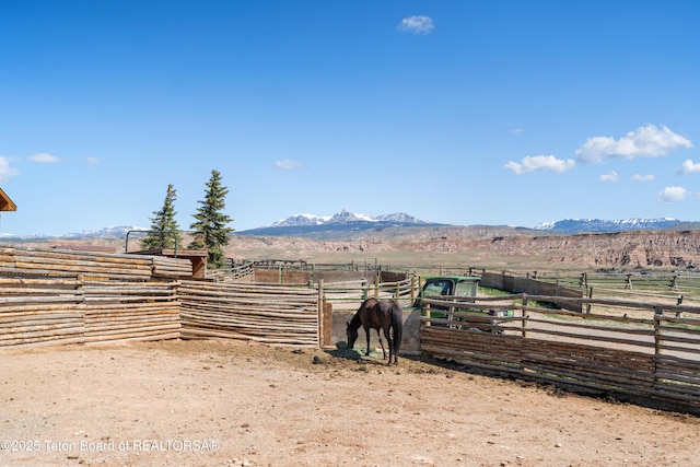14 Table Top Dr, Dubois, WY 82513 - view of yard with a rural view, a mountain view, and an exterior structure