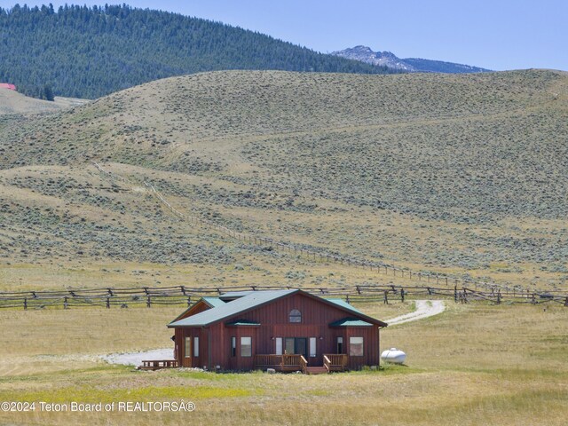 28 Table Top Dr, Dubois, WY 82513 - view of mountain backdrop with rural landscape