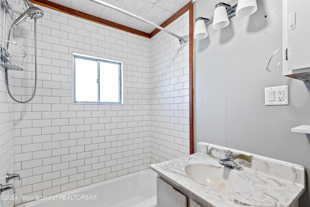 bathroom with vanity and shower / washtub combination