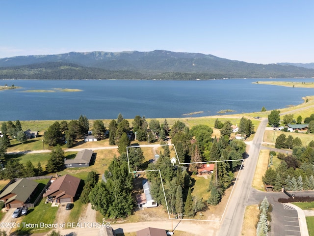 aerial view with a water and mountain view