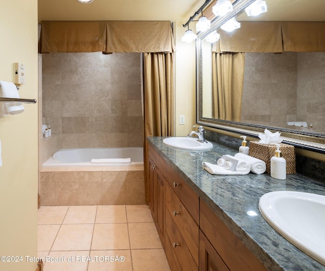 bathroom featuring tile patterned floors, vanity, and shower / tub combo