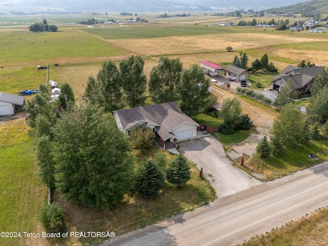 birds eye view of property featuring a rural view