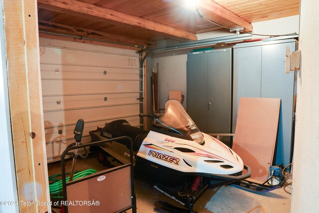 garage featuring wooden ceiling