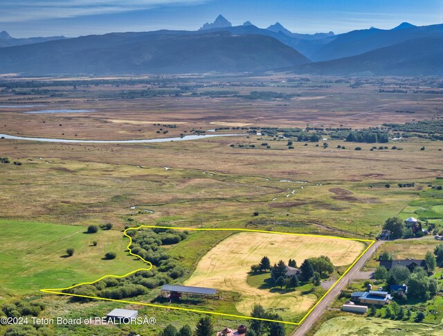 bird's eye view with a mountain view and a rural view