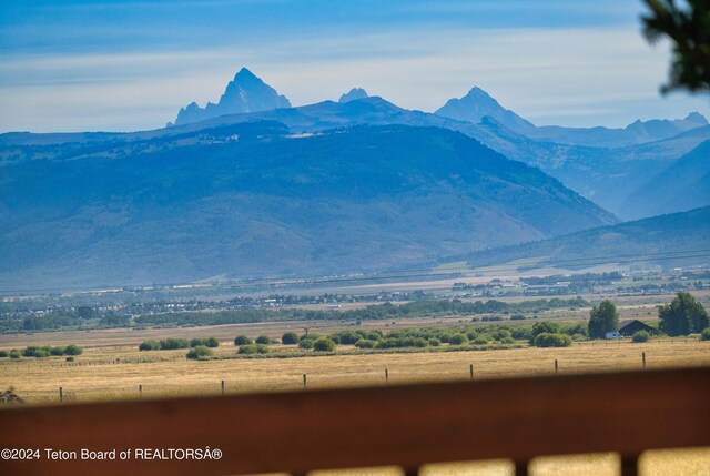 property view of mountains featuring a rural view