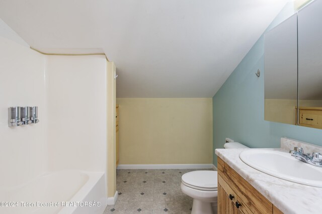 full bathroom featuring toilet, tile patterned flooring, vanity, vaulted ceiling, and shower / tub combination