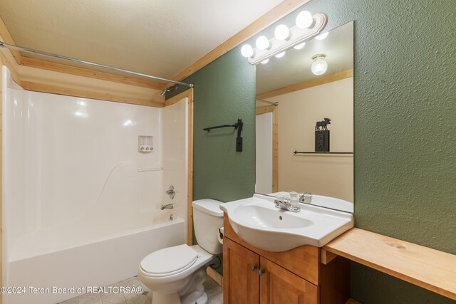 full bathroom featuring vanity, tile patterned flooring, a textured ceiling, bathing tub / shower combination, and toilet