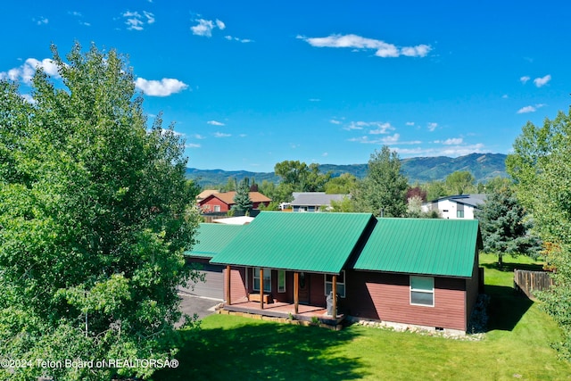 exterior space featuring a mountain view