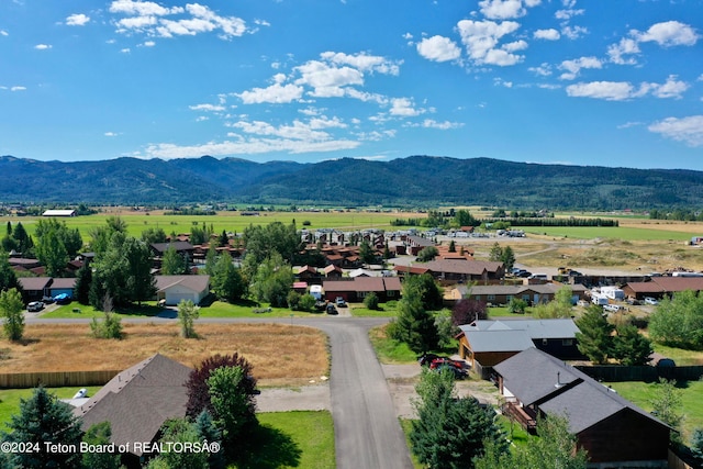 drone / aerial view featuring a mountain view