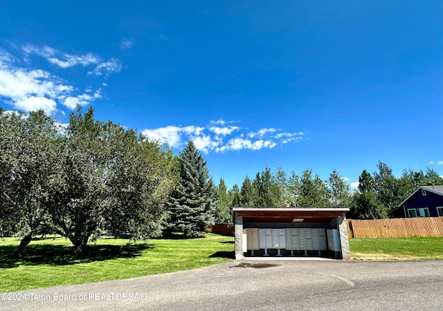 garage with a lawn