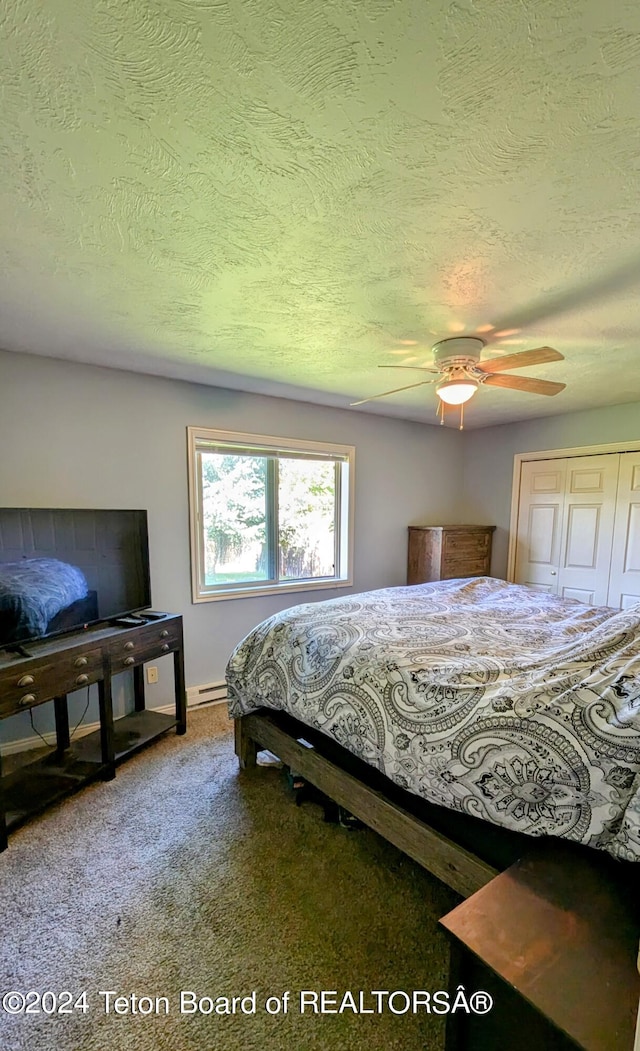 bedroom featuring ceiling fan, a closet, a textured ceiling, and carpet flooring