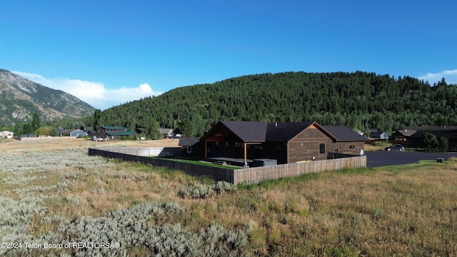 view of mountain feature with a wooded view