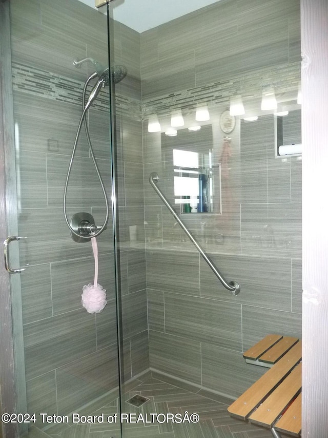 bathroom featuring a shower stall