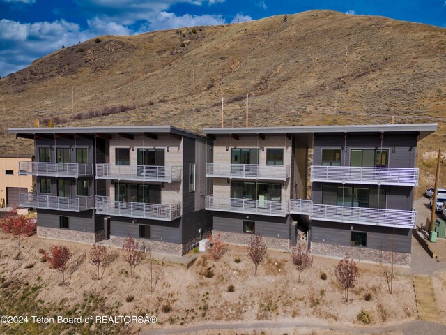 exterior space featuring a mountain view