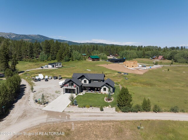 drone / aerial view featuring a mountain view